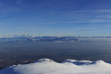 Panoramic view of the Alps from the Reculet mountain during winter